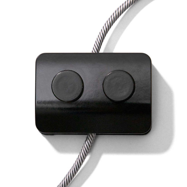 Double Single-Pole Foot Switch Black. Designed by Achille Castiglioni.