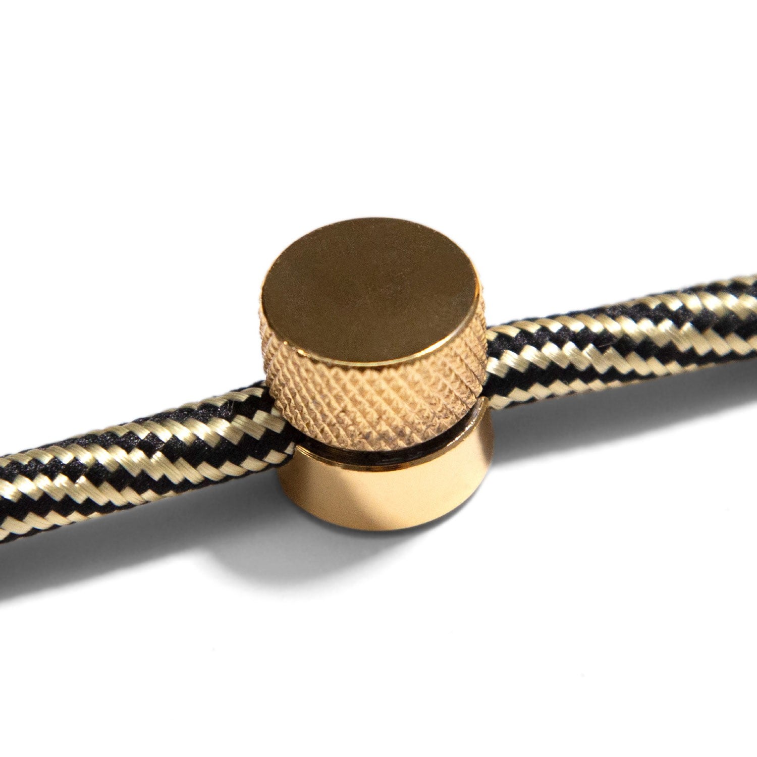 Sarè - Metal wall fairlead fixing for textile cable - Brass